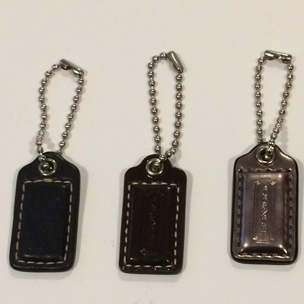 3/$23 Authentic Coach wristlets tags